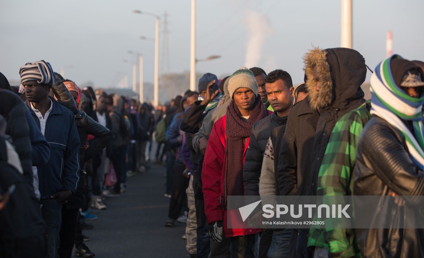 Relocation continues at Jungle spontaneous refugee camp in Calais, France