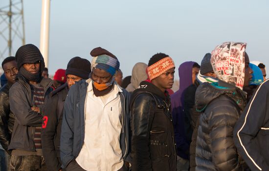 Relocation continues at Jungle spontaneous refugee camp in Calais, France
