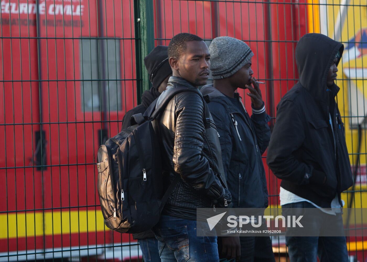 Relocation continues at Jungle spontaneous refugee camp in Calais, France