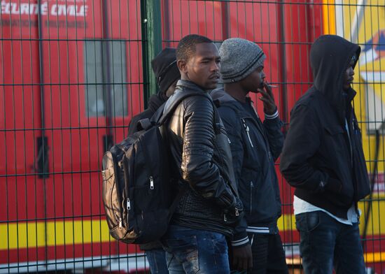 Relocation continues at Jungle spontaneous refugee camp in Calais, France