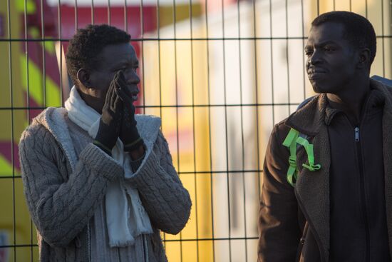 Relocation continues at Jungle spontaneous refugee camp in Calais, France