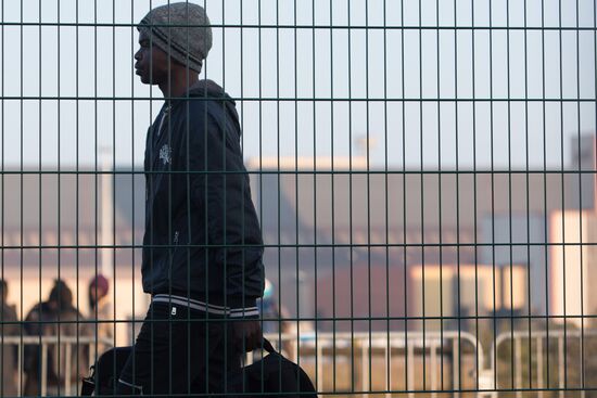 Relocation continues at Jungle spontaneous refugee camp in Calais, France