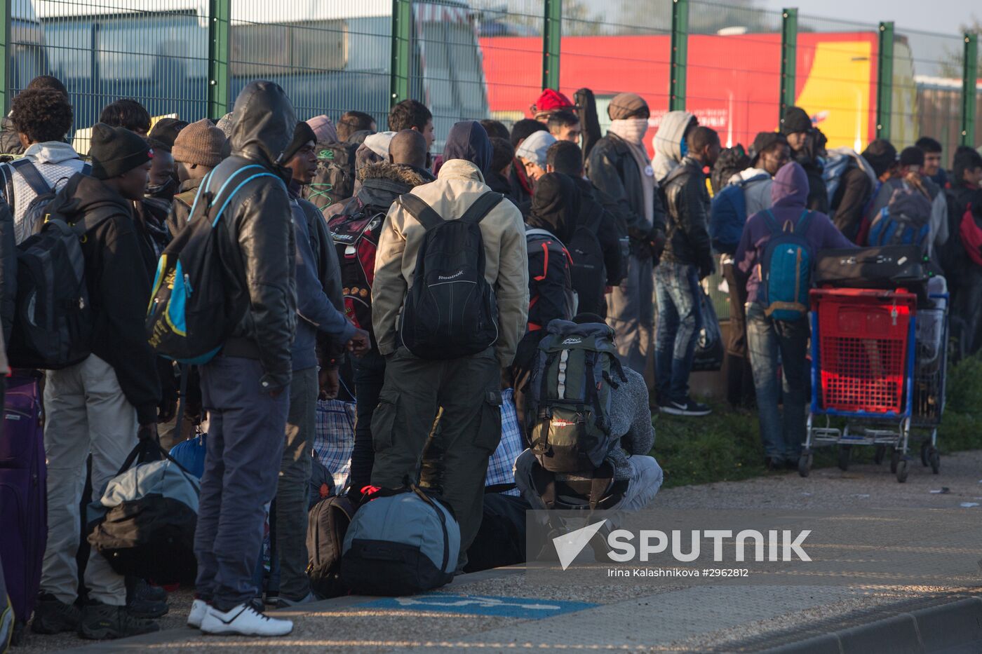 Relocation continues at Jungle spontaneous refugee camp in Calais, France