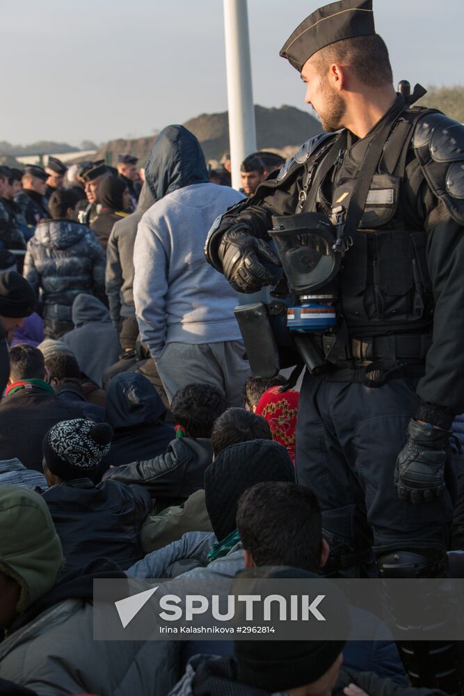 Relocation continues at Jungle spontaneous refugee camp in Calais, France