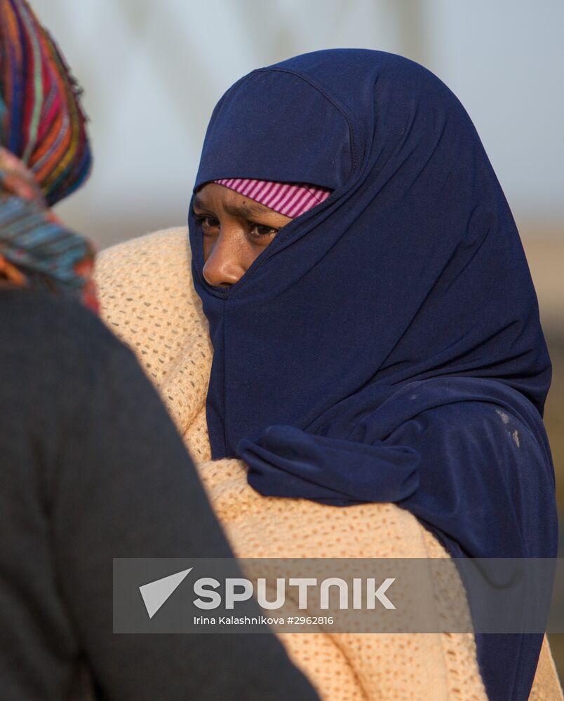 Relocation continues at Jungle spontaneous refugee camp in Calais, France