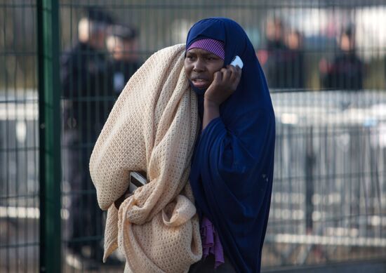 Relocation continues at Jungle spontaneous refugee camp in Calais, France