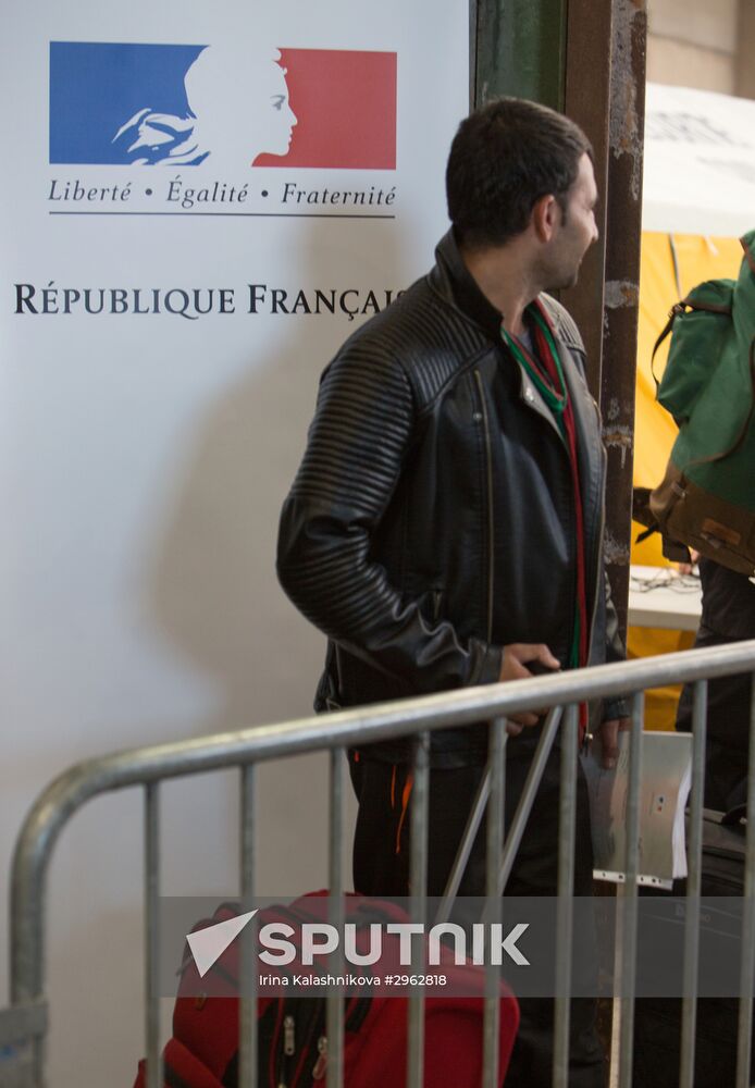 Relocation continues at Jungle spontaneous refugee camp in Calais, France