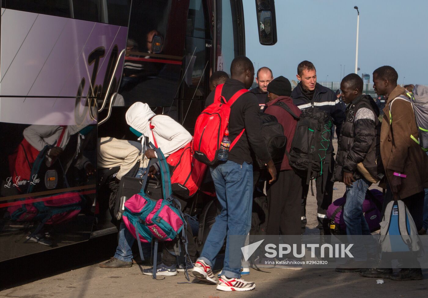 Relocation continues at Jungle spontaneous refugee camp in Calais, France