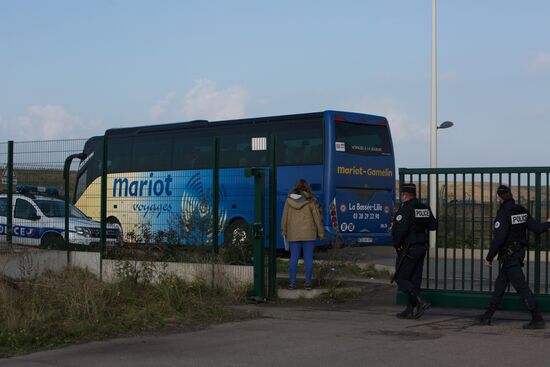 Relocation continues at Jungle spontaneous refugee camp in Calais, France