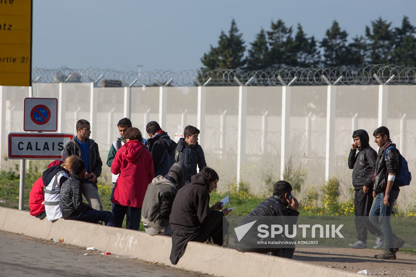 Relocation continues at Jungle spontaneous refugee camp in Calais, France
