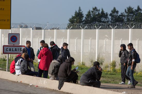 Relocation continues at Jungle spontaneous refugee camp in Calais, France