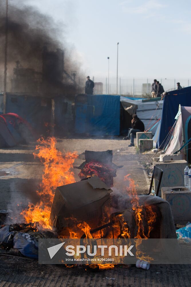 Relocation continues at Jungle spontaneous refugee camp in Calais, France