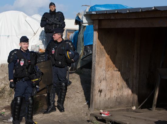 Relocation continues at Jungle spontaneous refugee camp in Calais, France