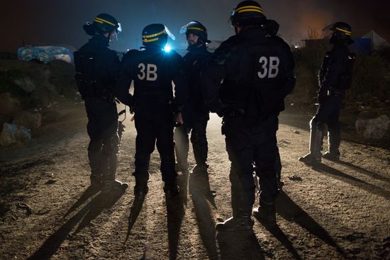 Relocation continues at Jungle spontaneous refugee camp in Calais, France