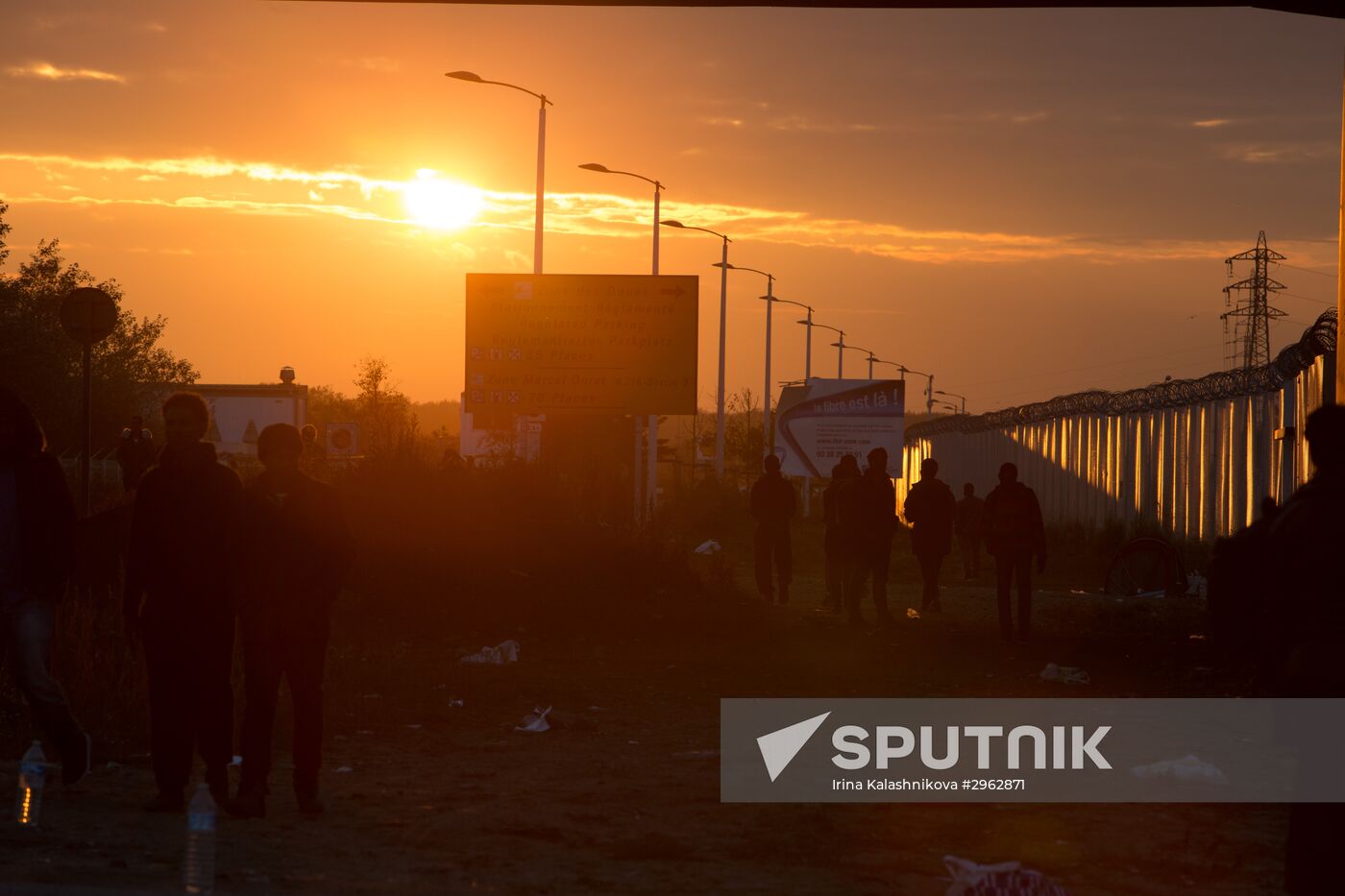 Relocation continues at Jungle spontaneous refugee camp in Calais, France