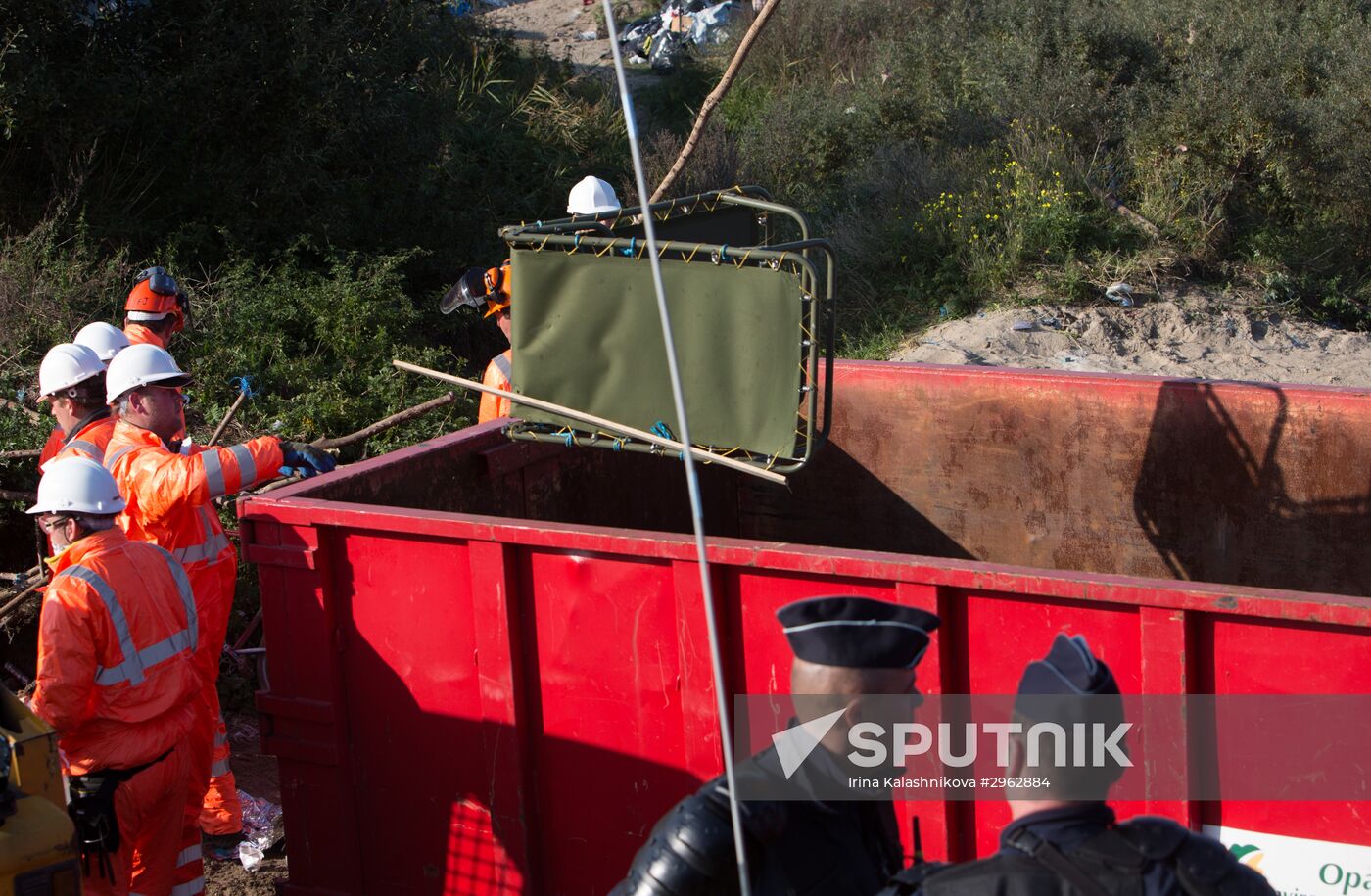 Relocation continues at Jungle spontaneous refugee camp in Calais, France