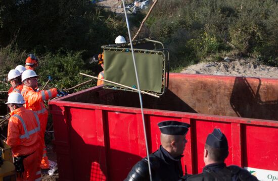Relocation continues at Jungle spontaneous refugee camp in Calais, France