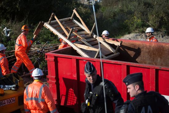 Relocation continues at Jungle spontaneous refugee camp in Calais, France