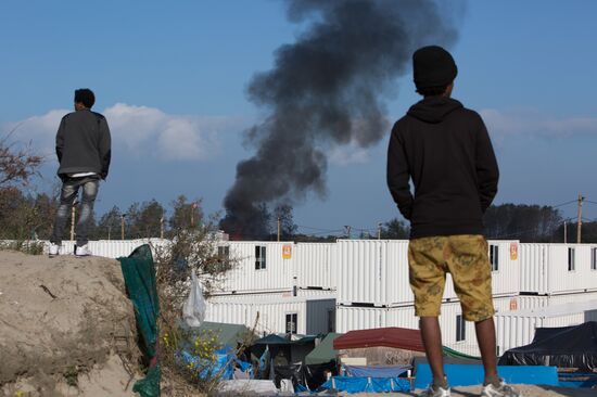 Relocation continues at Jungle spontaneous refugee camp in Calais, France