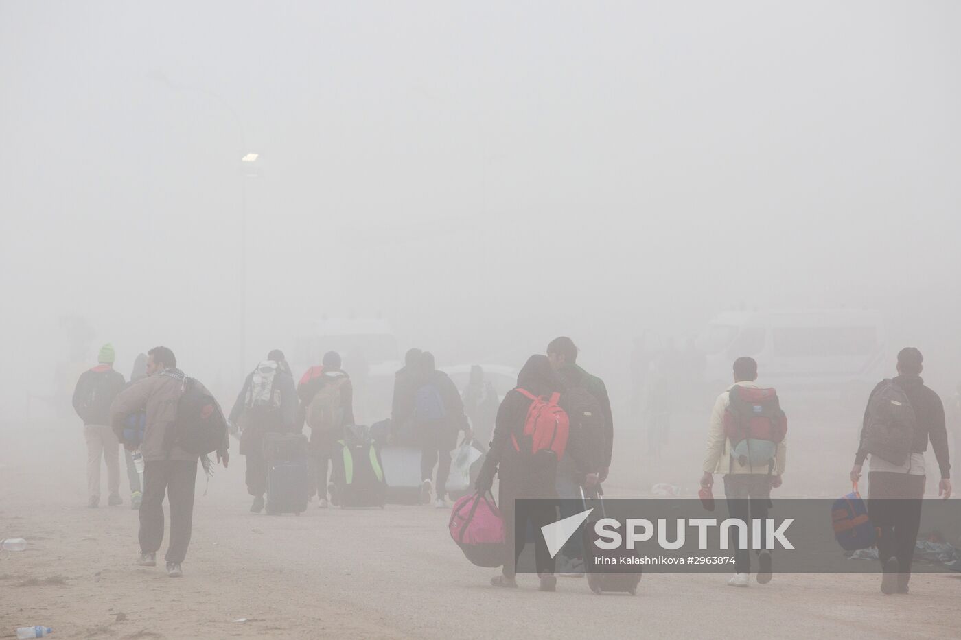 Relocation continues at Jungle spontaneous refugee camp in Calais, France