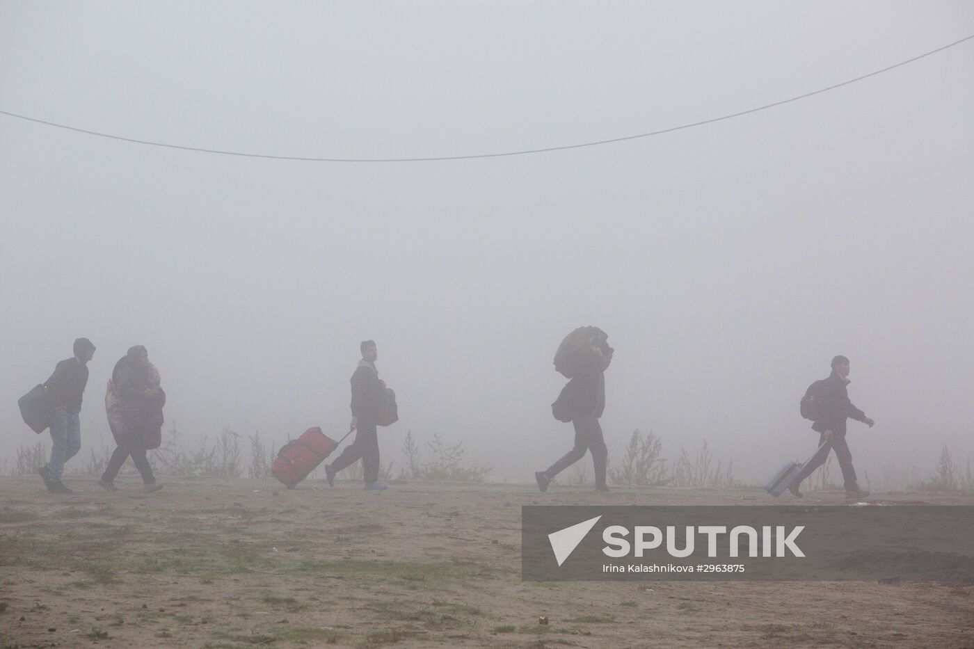 Relocation continues at Jungle spontaneous refugee camp in Calais, France