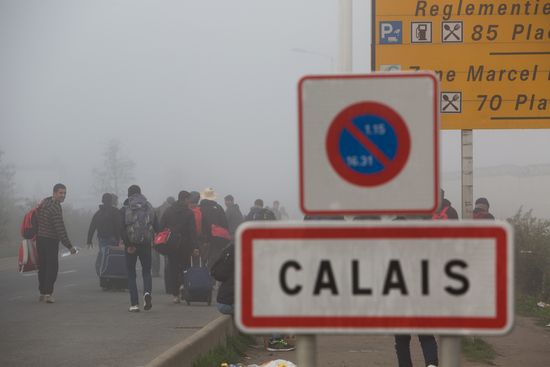 Relocation continues at Jungle spontaneous refugee camp in Calais, France