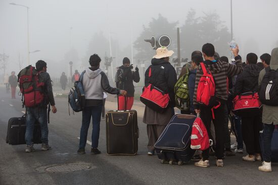 Relocation continues at Jungle spontaneous refugee camp in Calais, France