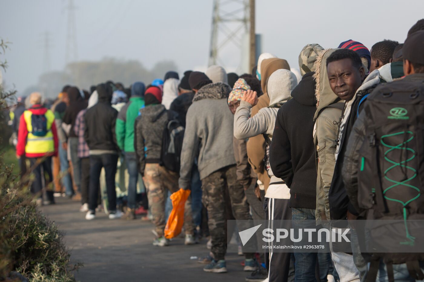 Relocation continues at Jungle spontaneous refugee camp in Calais, France