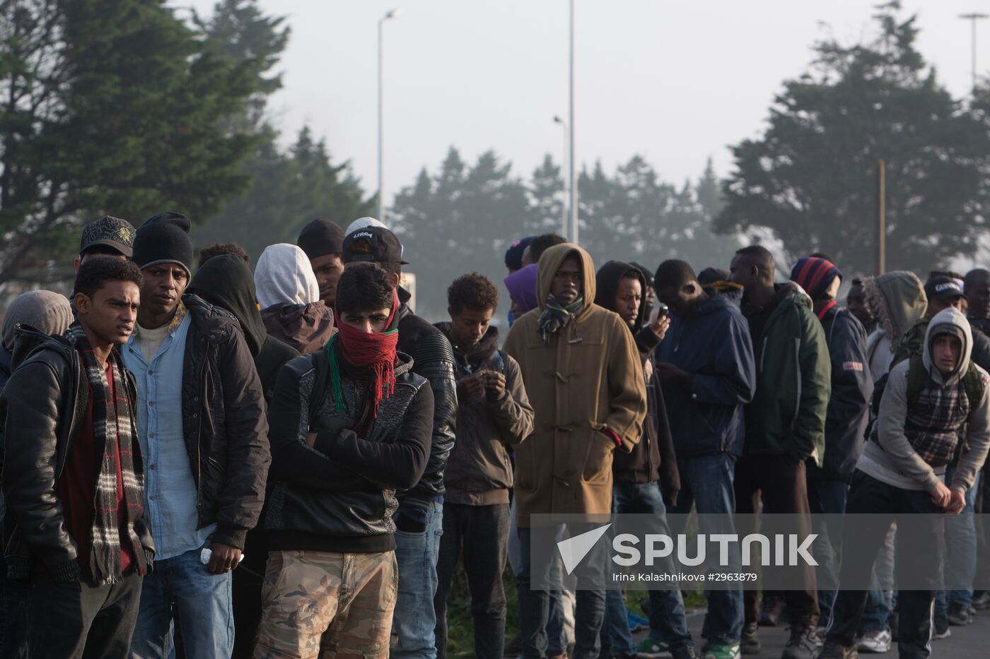 Relocation continues at Jungle spontaneous refugee camp in Calais, France