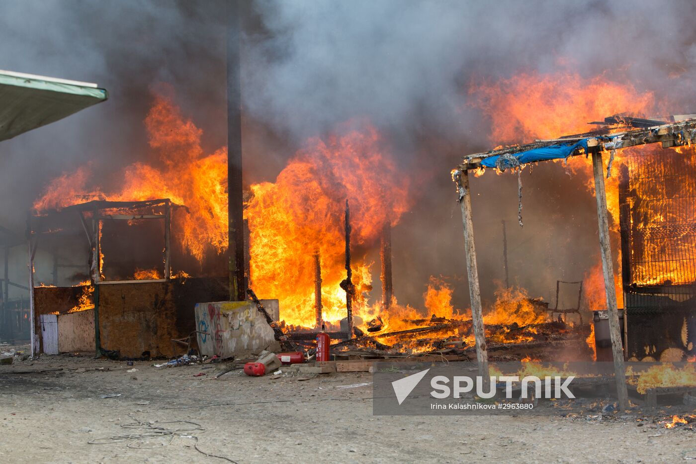 Relocation continues at Jungle spontaneous refugee camp in Calais, France