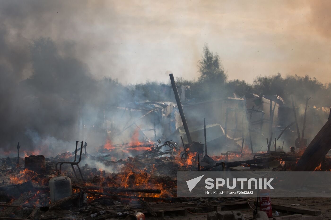 Relocation continues at Jungle spontaneous refugee camp in Calais, France