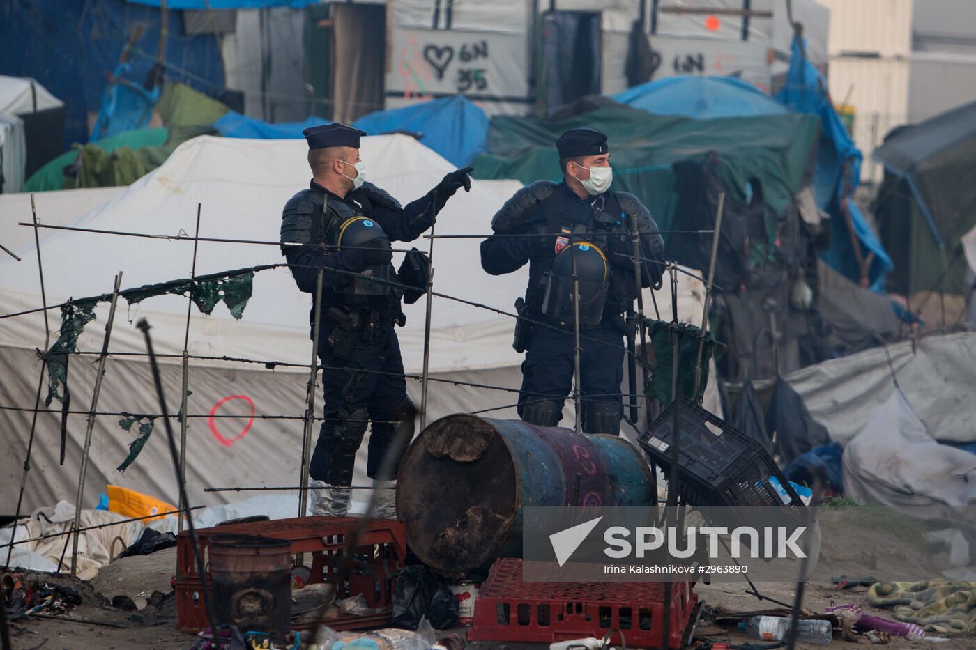 Relocation continues at Jungle spontaneous refugee camp in Calais, France