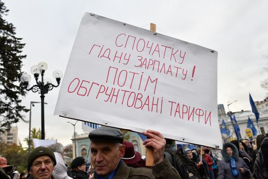 Meeting against high utility charges near Verkhovna Rada building in Kyiv