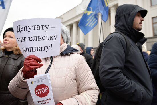 Meeting against high utility charges near Verkhovna Rada building in Kyiv