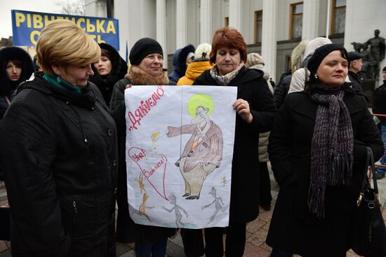Meeting against high utility charges near Verkhovna Rada building in Kyiv