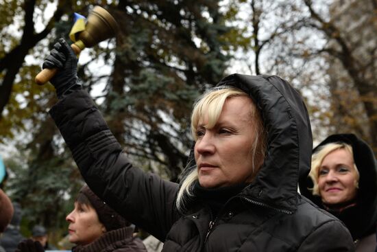 Meeting against high utility charges near Verkhovna Rada building in Kyiv