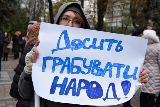 Meeting against high utility charges near Verkhovna Rada building in Kyiv