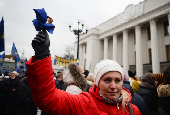 Meeting against high utility charges near Verkhovna Rada building in Kyiv