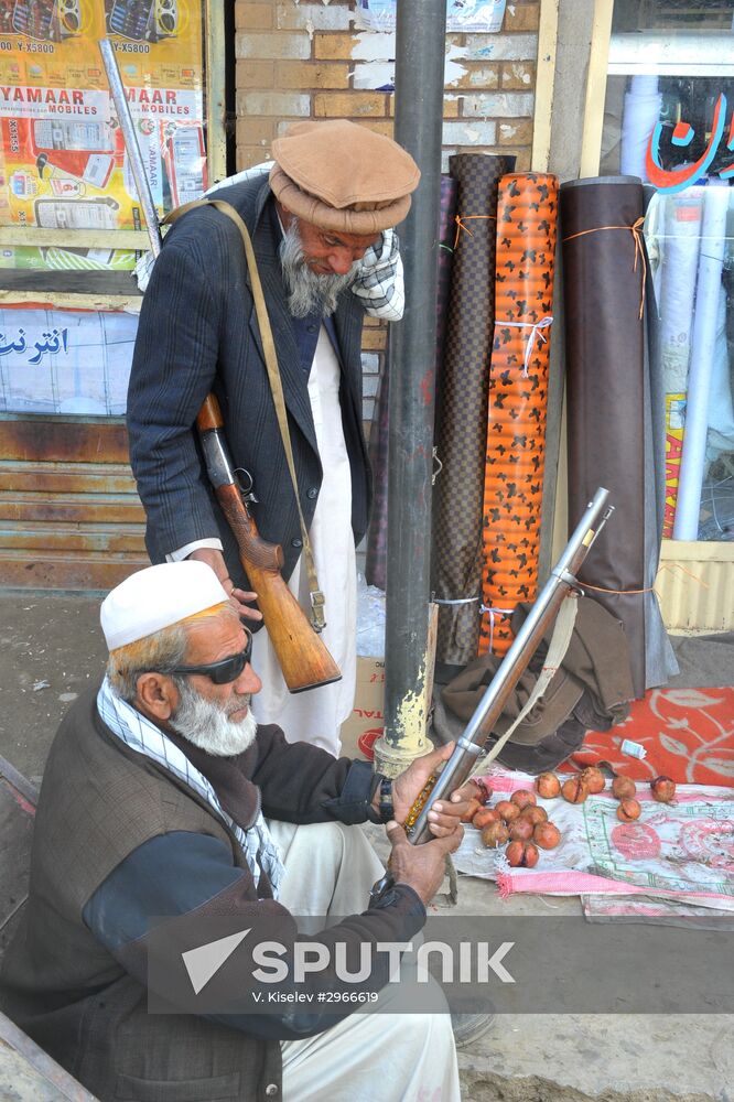 Residents of Afghanisgtan with British BUR rifle