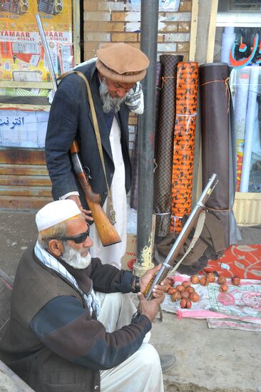Residents of Afghanisgtan with British BUR rifle
