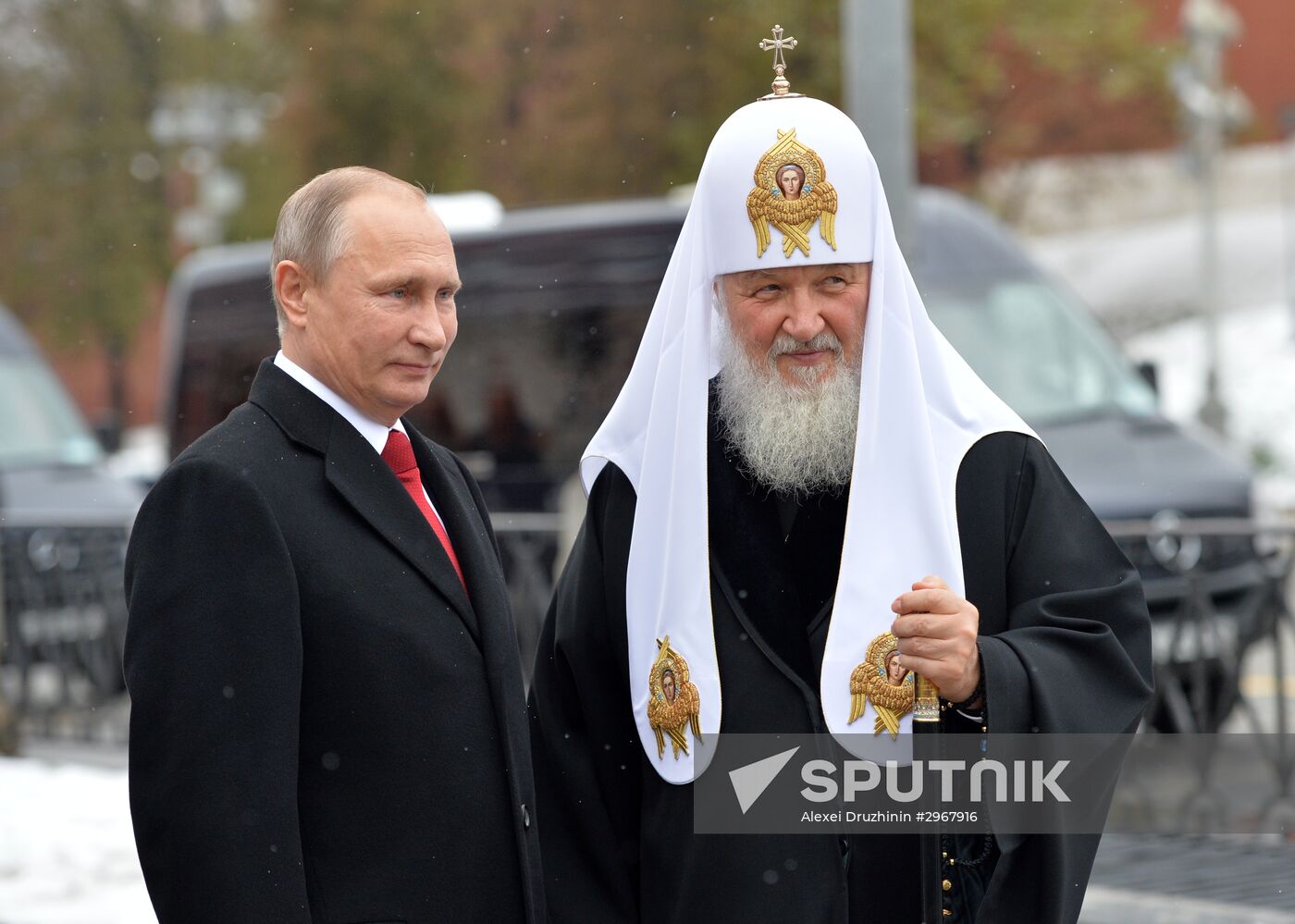 President Vladimir Putin lays flowers at Minin and Pozharsky monument on Red Square