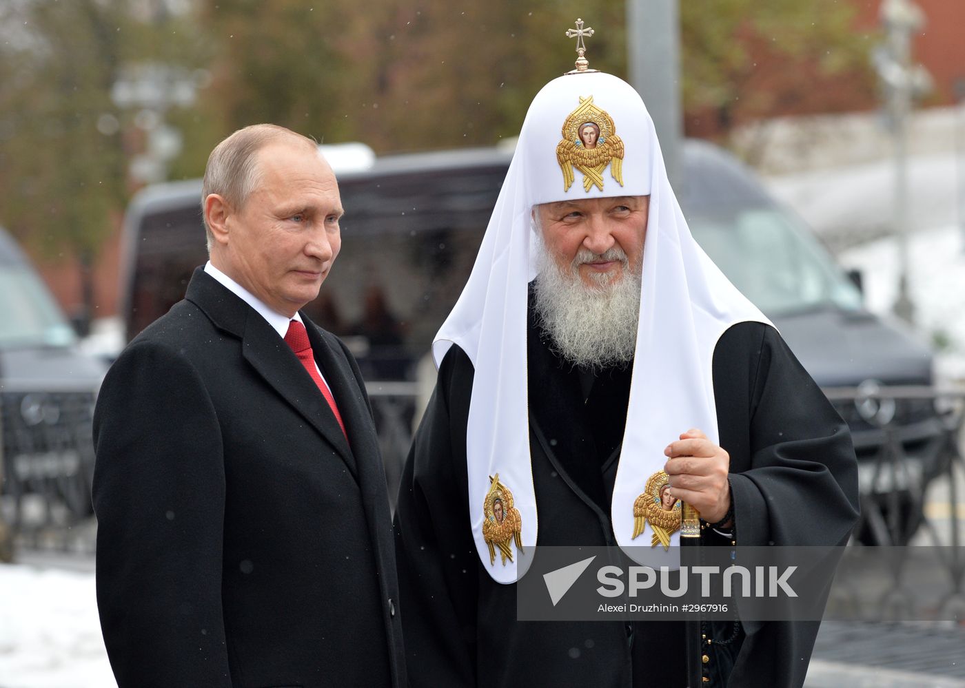President Vladimir Putin lays flowers at Minin and Pozharsky monument on Red Square
