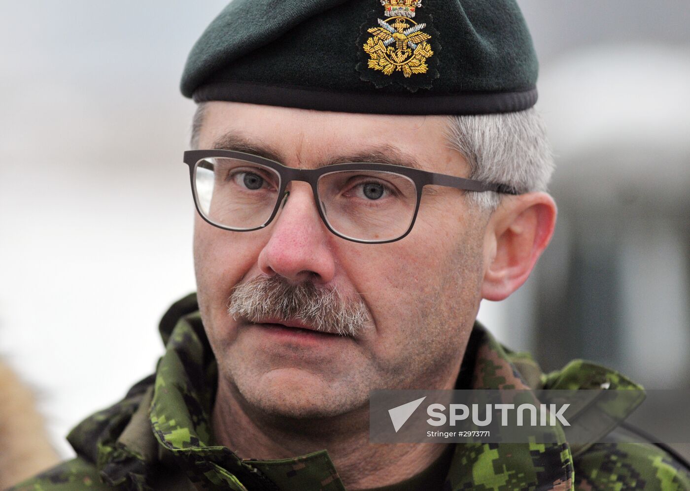 Commander of Canadian Army Paul Wynnyk inspects Ukrainian military units