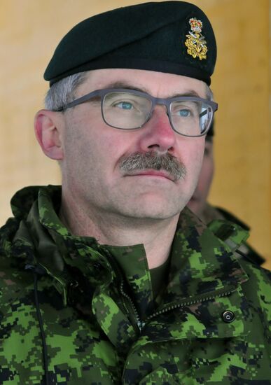Commander of Canadian Army Paul Wynnyk inspects Ukrainian military units
