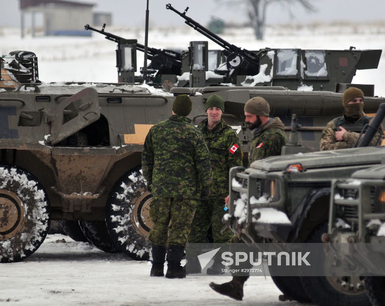 Commander of Canadian Army Paul Wynnyk inspects Ukrainian military units
