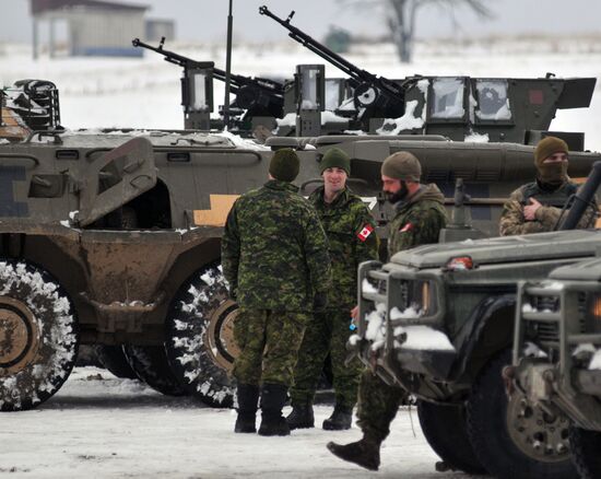Commander of Canadian Army Paul Wynnyk inspects Ukrainian military units