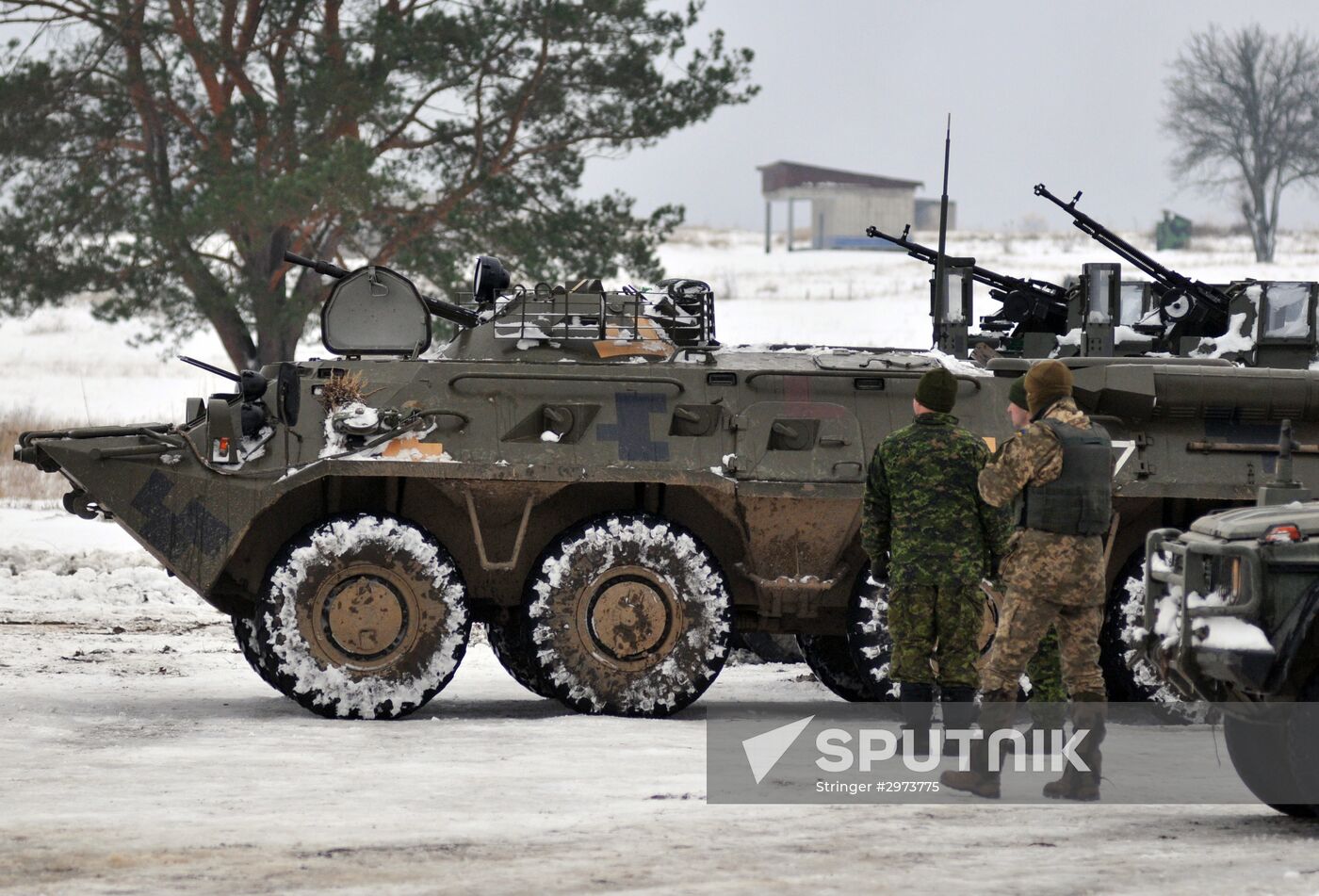 Commander of Canadian Army Paul Wynnyk inspects Ukrainian military units
