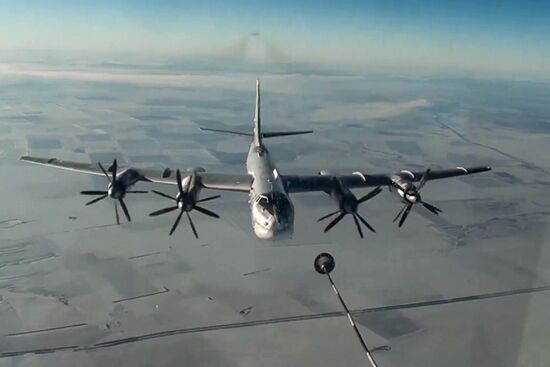 Russian Air Force Tupolev 95M aircraft launch cruise missiles at terrorists in Syria