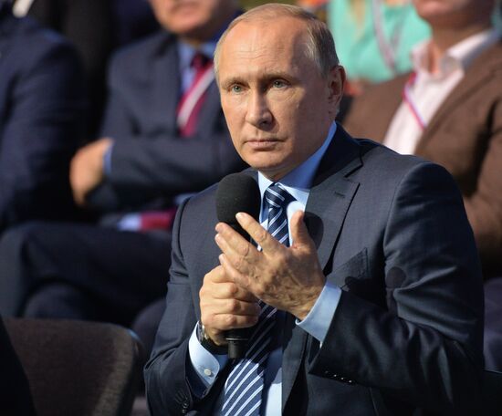 Russian President Vladimir Putin attends concluding meeting of Russian Popular Front’s interregional forum