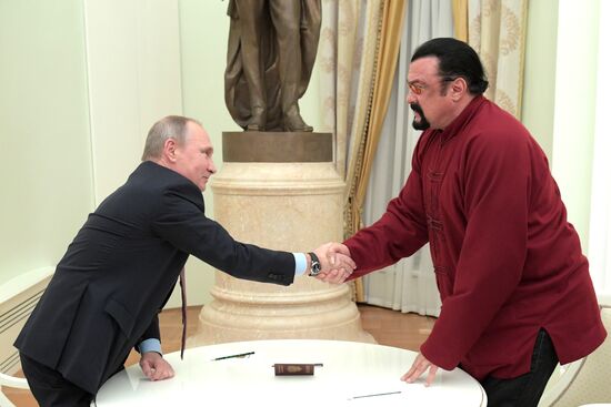 President Putin meets with US actor Steven Seagal